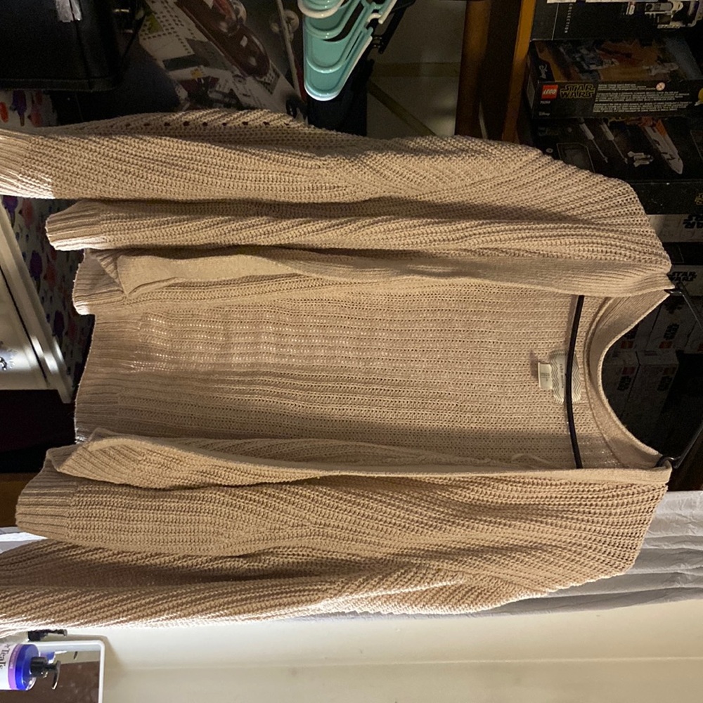 I’m selling this knit cardigan very light weight goes with everything